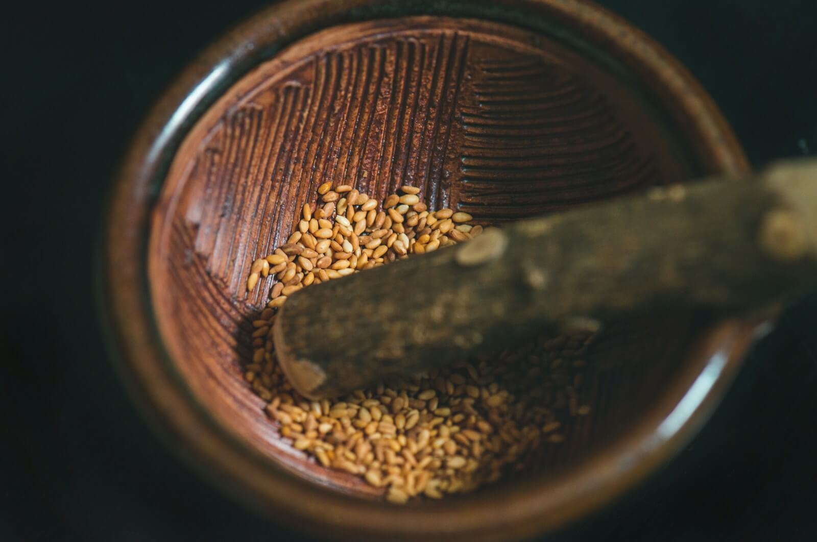 Photo by Levi T. close up photo of brown seed inside bowl
